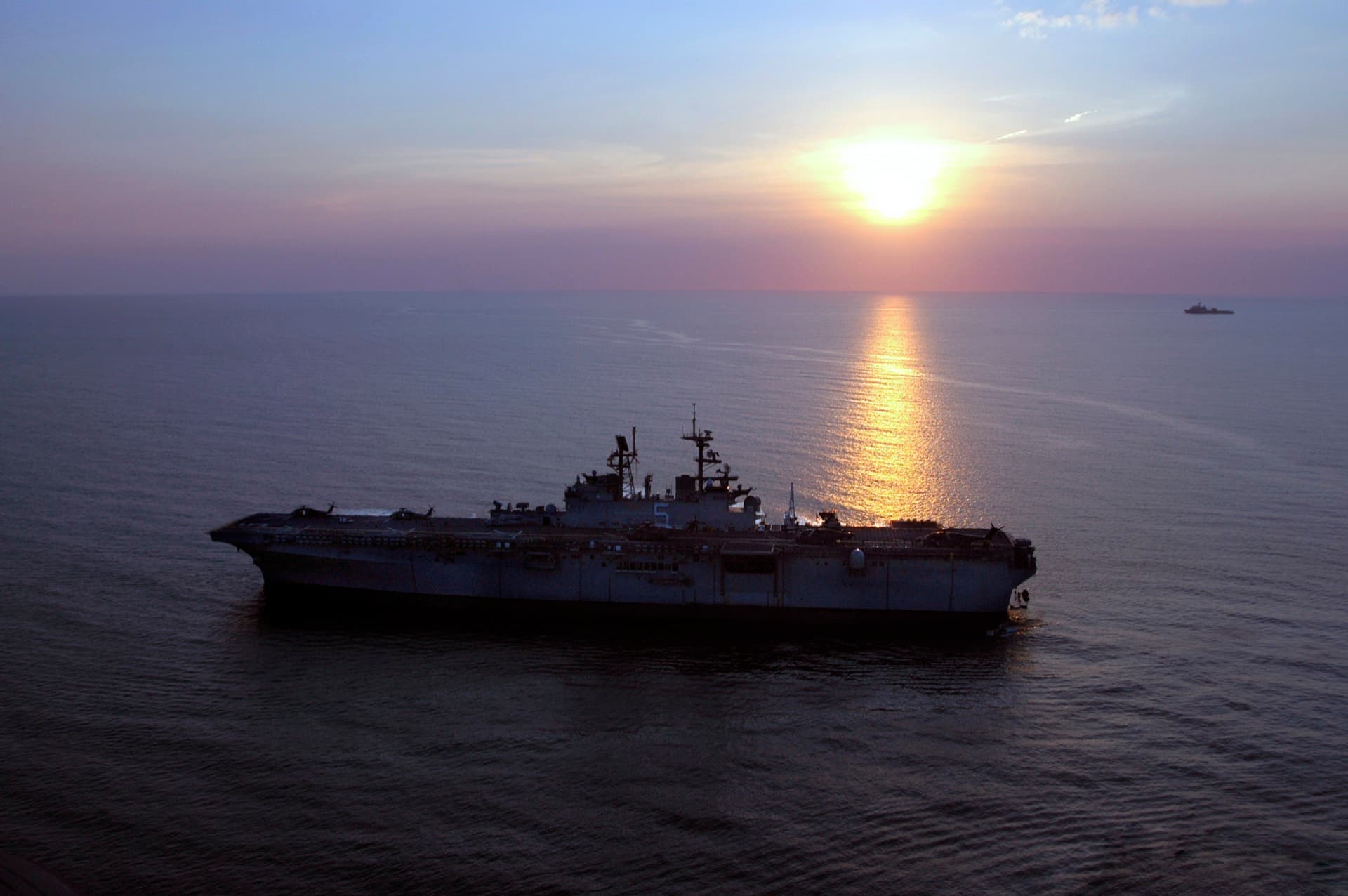 Naval ship at dusk